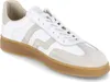 A single white sneaker with beige accents and a brown sole is shown against a white background. Produktbild-Vorschau