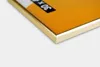 A close-up view of the corner of a picture frame with an orange insert. Podgląd zdjęcia produktu