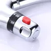 A close-up shot of a chrome faucet with temperature markings. Náhled obrázku produktu