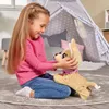 A young girl playing with a stuffed dog in a child's room with a teepee. Anteprima dell’immagine prodotto