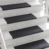 A set of black stair mats on granite stairs. Anteprima dell’immagine prodotto