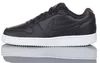 A black Nike sneaker with a white sole, shown from the side on a white background. Produktbild-Vorschau