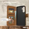 A brown leather flip phone case is shown open, displaying its interior features like card slots and a photo window. The back of the case, designed to hold a phone, is also visible. Produktbild-Vorschau