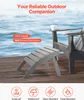 An outdoor ottoman and chair on a wooden deck with water in the background. Produktbild-Vorschau