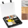A repair kit for floors and tiles, including a wax melter and various colored wax sticks, is displayed open in its case. Produktbild-Vorschau