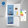 A white refrigerator with its doors open, showing the interior compartments and contents. An energy efficiency label is visible on the right. Produktbild-Vorschau