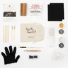 A flat lay of a Kintsugi repair kit with various components arranged on a white background. Podgląd zdjęcia produktu