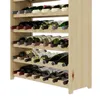 A wooden wine rack filled with wine bottles. Produktbild-Vorschau