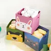 Three toy storage boxes with animal faces stacked on a rug. Náhled obrázku produktu