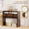 A rustic-style desk with drawers and storage, set against a plain background with some decorative items on top. Náhled obrázku produktu