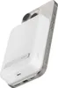 A white magnetic power bank is attached to the back of a silver smartphone. Voir les images du produit