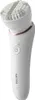 A white electric facial cleansing brush with a rose gold accent ring. Podgląd zdjęcia produktu
