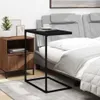 A bedside table and a C-shaped side table next to a bed. Náhled obrázku produktu