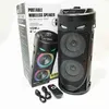 A portable Bluetooth speaker and its packaging are displayed on a white background, along with its accessories. Produktbild-Vorschau