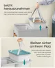 A split image showing a person removing and placing a laundry basket insert into a larger laundry basket. Produktbild-Vorschau