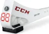 A close-up studio shot of a white CCM hockey skate guard with red digital numbers and branding. Voir les images du produit