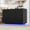 A modern black sideboard with LED lighting in a room setting. Anteprima dell’immagine prodotto