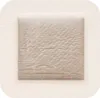 A close-up, top-down view of a single medical dressing on a white background. Anteprima dell’immagine prodotto