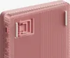 A close-up view of the back of a pink mechanical keyboard, showing a hinge mechanism and textured surface. Voir les images du produit
