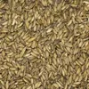 A close-up, top-down view of a pile of thistle seeds. Produktbild-Vorschau