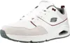 A single white sneaker with gray and burgundy accents is shown from a side-angle against a white background. Voir les images du produit