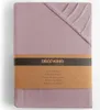 A folded fitted sheet with a product band around it. Podgląd zdjęcia produktu