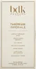 The image shows the front of a perfume box with the brand name, product name, and scent notes listed. Voir les images du produit