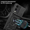 A black armor phone case with a ring holder is shown attached to a car air vent mount. Produktbild-Vorschau