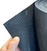 A hand holding a piece of black mesh material, with a roll of the same material in the background. Produktbild-Vorschau