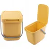 Two views of a yellow plastic waste bin with a lid and handle, shown against a white background. Produktbild-Vorschau