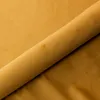 A close-up view of a rolled piece of honey-yellow fabric, likely velvet or a similar soft material, with a subtle sheen. Náhled obrázku produktu