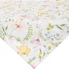 A close-up view of a tablecloth with a floral pattern. Produktbild-Vorschau