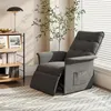 A dark gray recliner chair is shown in a well-lit room with a bookshelf and a plant. Produktbild-Vorschau