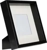 A black 3D object frame with a cream-colored matting, tilted on its stand against a white background. Náhled obrázku produktu