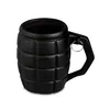 A black mug shaped like a grenade, shown from a side angle on a white background. Voir les images du produit