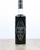 A bottle of Antica Sambuca Liquorice Flavour Liqueur is shown against a white background, placed on a wooden surface. Produktbild-Vorschau