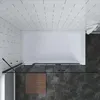 A top-down view of a modern bathroom with a bathtub and shower enclosure. Produktbild-Vorschau