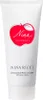 A white tube of Nina Ricci Nina Soft Body Lotion with a red apple logo and brand name. Náhľad obrázku produktu
