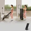 A woman is using a foldable treadmill in a living room, and another shot shows the treadmill folded. Podgląd zdjęcia produktu