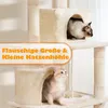 A multi-level cat tree with two cats inside enclosed spaces. Podgląd zdjęcia produktu