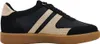 A single black sneaker with beige and gold accents and a brown sole, shown from the side against a white background. Anteprima dell’immagine prodotto
