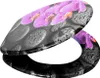 A toilet seat with a floral and stone pattern. Produktbild-Vorschau