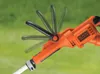 Close-up of the handle and motor housing of an orange and black string trimmer, with the handle shown in multiple positions to indicate adjustability. Náhľad obrázku produktu