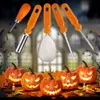 A collection of pumpkin carving tools arranged above carved pumpkins and autumn leaves, with a blurred background of a building and bats. Náhled obrázku produktu