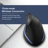 A black wireless mouse with blue LED accents is shown next to a laptop. Produktbild-Vorschau