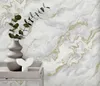 A vase with eucalyptus branches and a decorative object sit on a tray against a marble-patterned wallpaper. Produktbild-Vorschau