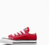 A single red Converse Chuck Taylor All Star sneaker for children is shown against a white background. Voir les images du produit