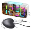 A digital alarm clock with a vibrating pad, displayed in a bedroom setting with a city view. Produktbild-Vorschau