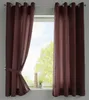 Two brown curtains are shown hanging in front of a window. The left curtain is tied back with a fabric tie. Produktbild-Vorschau