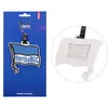 A product shot of a Hertha BSC Berlin luggage tag, shown both on its packaging and as a close-up. Produktbild-Vorschau